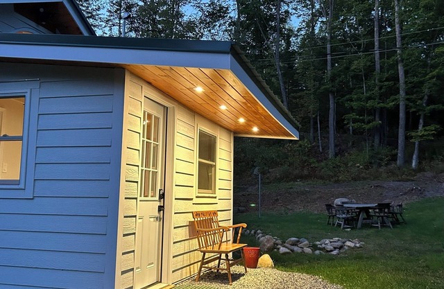 Just listed! Remodeled, brookside cottage nestled in private 20-acre forest
