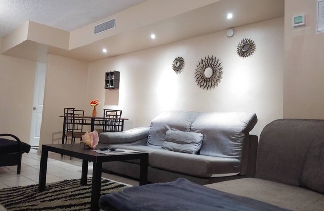 JUST MINUTES AWAY FROM AIRPORT AND BEACHES