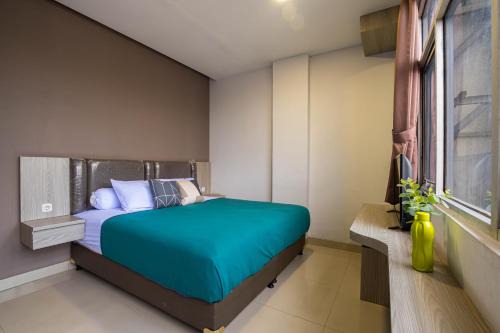 Kelowna Mangga Besar by AbdiHome