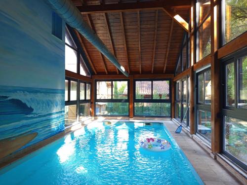 La Casa Malvarrosa- piscina climatizada