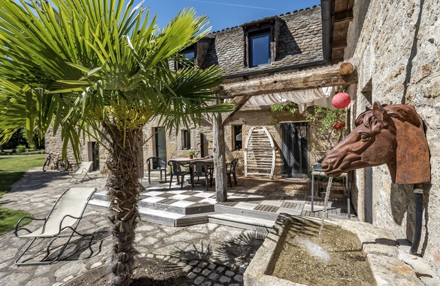 La Case à Tom with enclosed wooded park, private swimming pool, children's playground in Lozère
