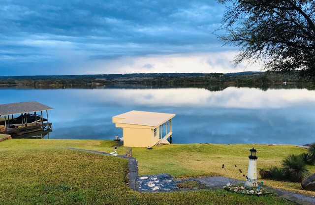 Lake Front property on Inks Lake with beautiful lake views/dock/swimming area.