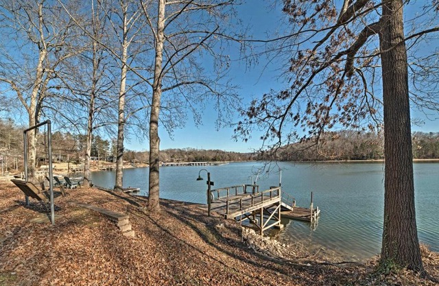 Lakefront Harrison Home with Sunroom, Deck, and Dock!