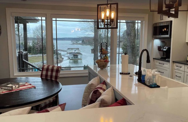 Lakefront home with private beach & gourmet kitchen