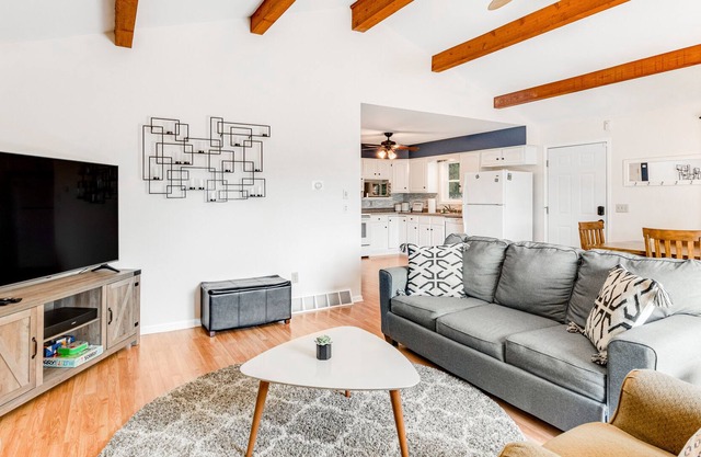 Lakefront home with deck, patio, dock, fire pit, kayak, & gas fireplace