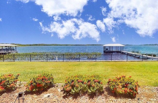 Lakefront home with private dock, garage parking, sunroom,W/D and WIFI