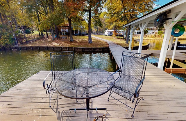 Lakefront retreat with kayaks, grill, games, open interior, & W/D - dog-friendly