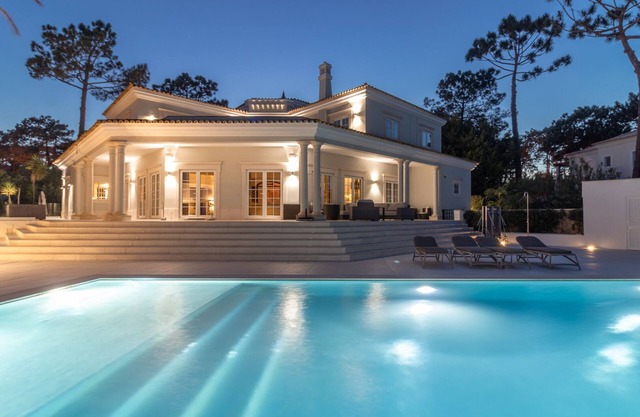 Large elegant Villa overlooking Golf Course with large outdoor BBQ and Pool area