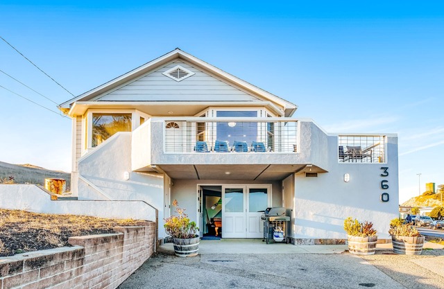 Large home with game room & furnished deck with ocean & pier Views