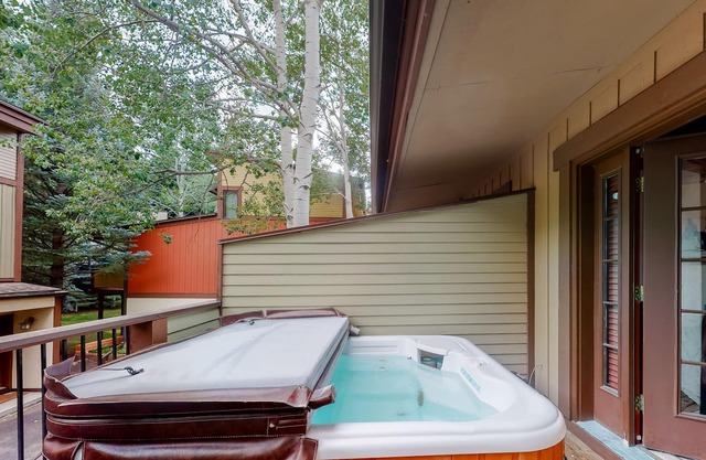 Large home with views from deck, fireplace & covered carport - near Vail gondola