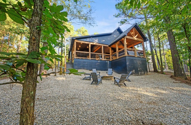 Large luxury cabin with hot tub deck. Fan-cooled patio and comfy seating.