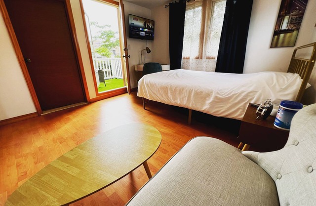 Large sunny room with private bath & balcony