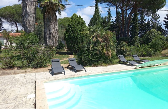 Large villa with 11x5m pool in 7700 M2 grounds. Veranda and multiple terraces.