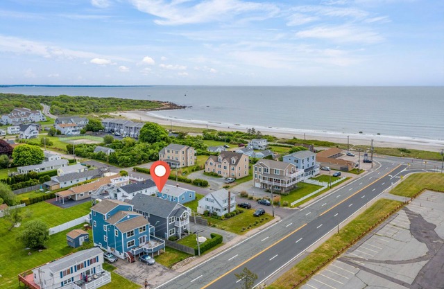 Less than 1000 feet from sinking your toes into the beach!