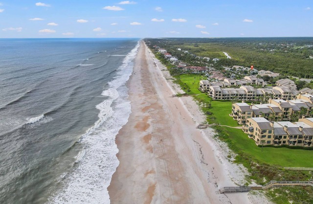 Light and Airy Luxury Condo just Steps from Private Beach Access