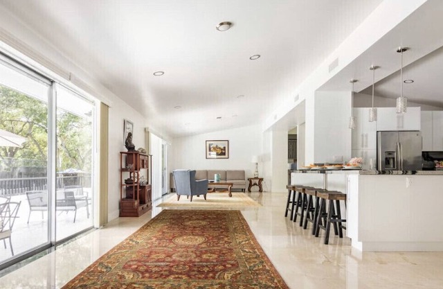 Little Pinecrest Luxurious 5 bedroom villa with private pool and sport court.
