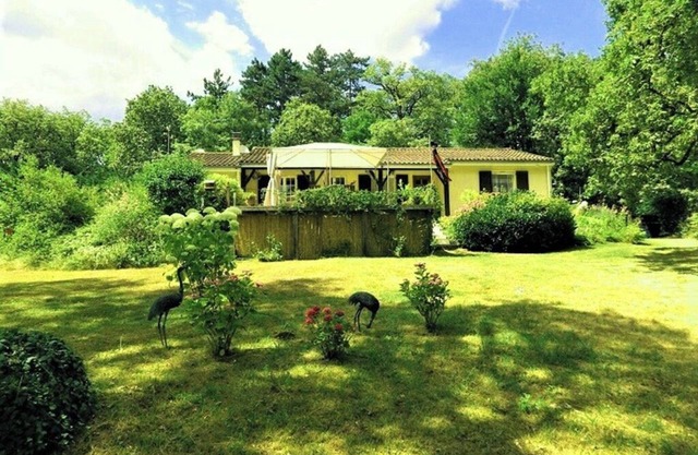 Located in a tranquil woodland setting.