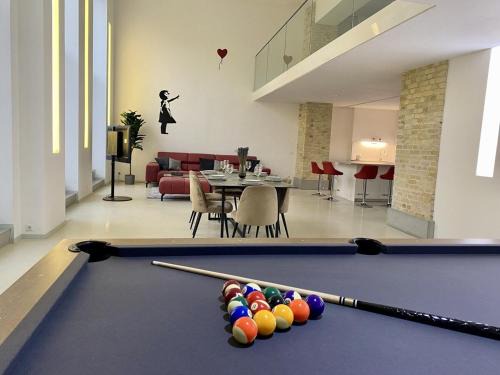 Loft With Pool Table, Kitchen Island & Gallery