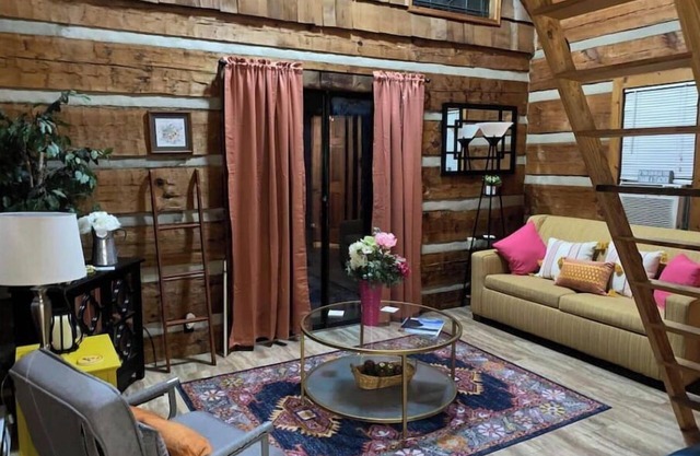 Log Cabin on Main St. In the ❤️ of Winston Salem. Sleeps 4 comfortably.
