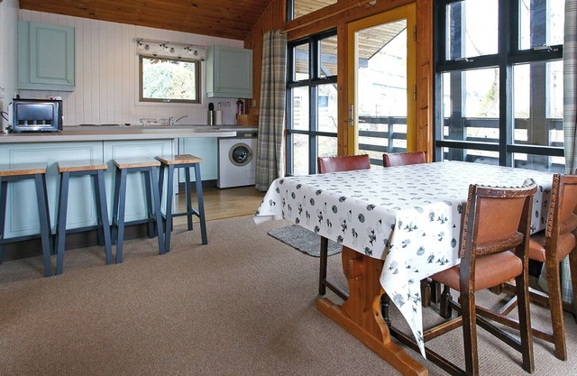 Log cabin with one double with ensuite shower and two twin.