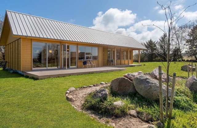 Look forward to your vacation in this modern vacation home with sea view.