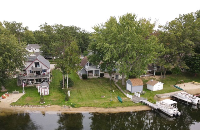 Loon Lookout has its own beach and is on a private lake in West Branch, MI