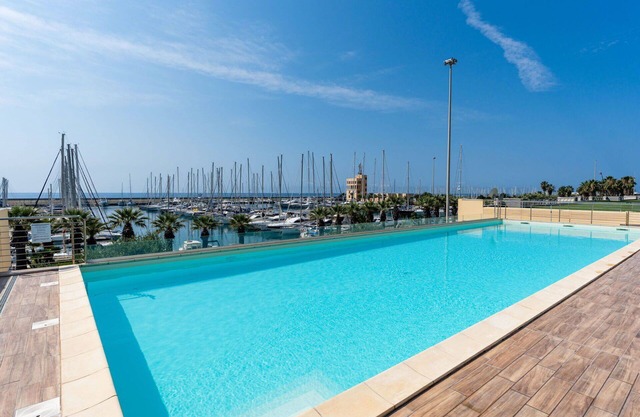 Lovely apartment for 4 people with A/C, pool, WIFI, TV and terrace