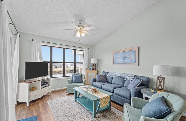 Lovely canal front condo with pool, kitchen, washer/dryer, TV, & board games
