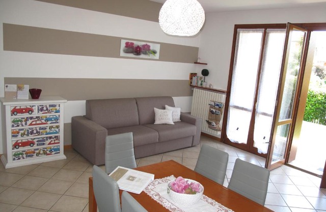 Luminoso Trilocale con Piscina e Giardino privato