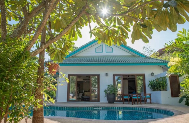 Luxurious 4-bedroom villa steps from Hua Thanon Beach with coastal views