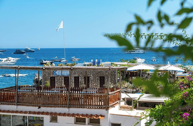 Luxurious Beach House with AC in Capri. Stunning views & steps from the beach