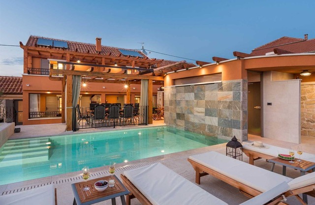 Luxurious five star heated pool villa for 10-12 people