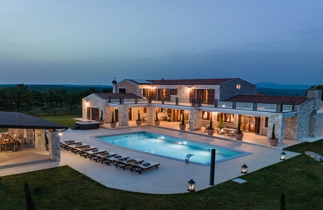 Luxurious poolside villa on spacious estate