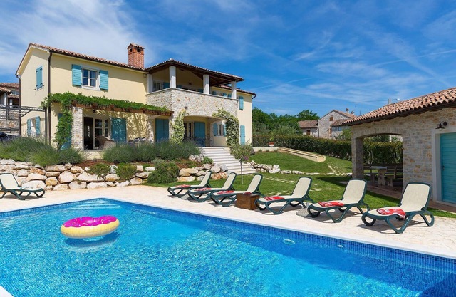 Luxurious villa with swimming pool and large garden