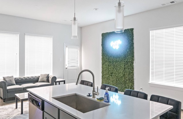 Luxury Condo Downtown + Neon Photowall