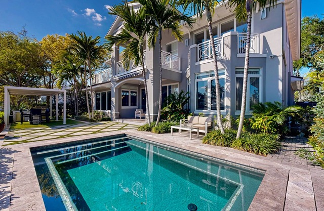 Luxury home with yacht accommodations, gym, sauna, pool/spa & waterfront views