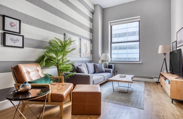 Luxury Tribeca 1BR w/Gym, Doorman + Roof deck by Blueground