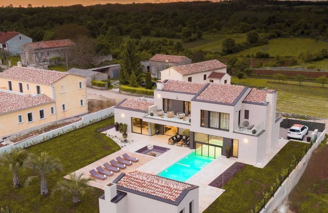 Luxury Villa with a heated indoor pool, wellness and spacious outside living.