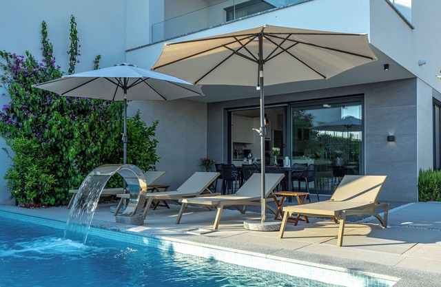 Luxury villa with open sea view and its own multi-purpose sports ground