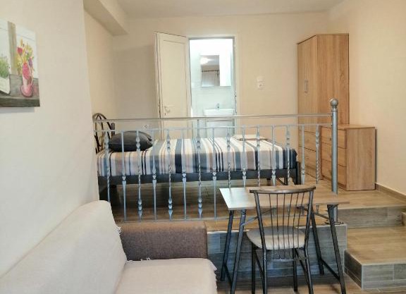 Marina's Apartments - White & Stone Apartment