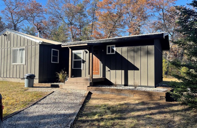 Minutes to town or very peaceful woods retreat! Close to trails and golf.