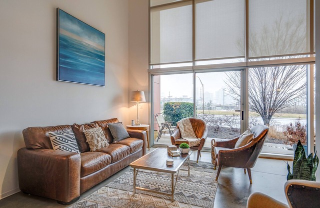 Modern 2-Story Loft with Skyline Views, Balcony & 2 Living Areas