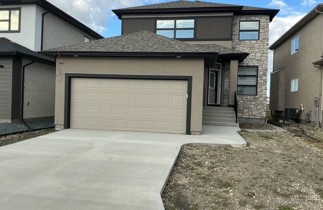 "Modern 2BR Suite with Private Entrance, Workspace, A/C & Parking in Sage Creek"