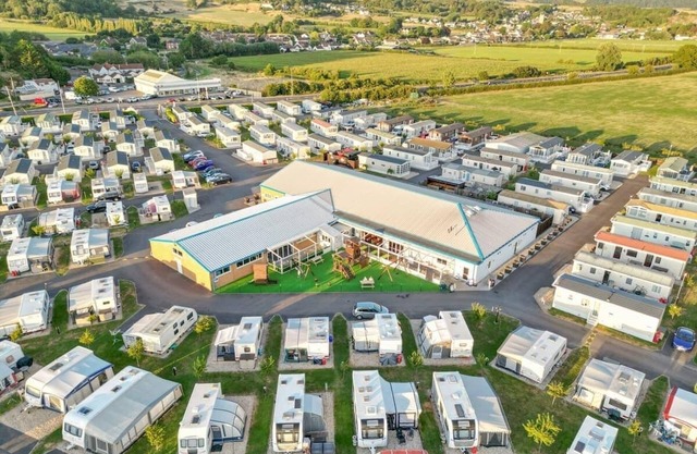 Modern and contemporary 12ft-wide caravan with one double and one twin.