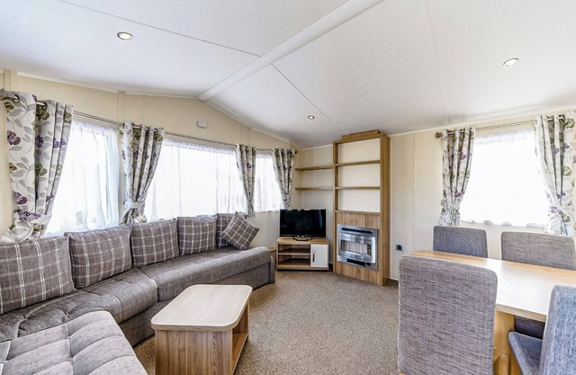 Modern and contemporary 12ft-wide caravan with two twin.