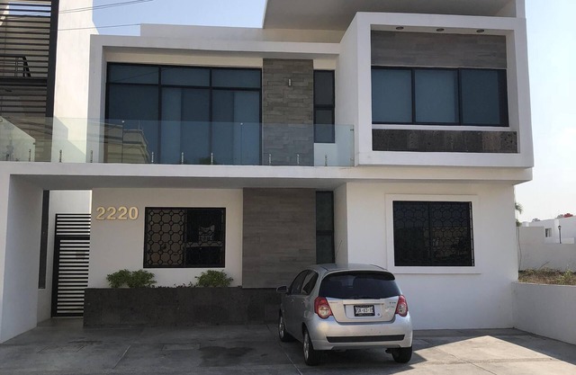 Modern Apt 1st level with rooftop 5 min from the beach. (WiFi,Cable,AC,Boiler)