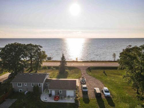 Modern Home on Mille Lacs Lake! Amazing yard and game-room!