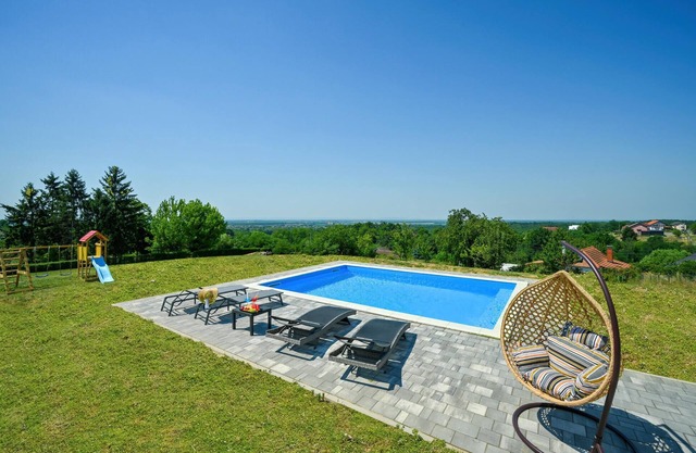 Modern home with pool and view