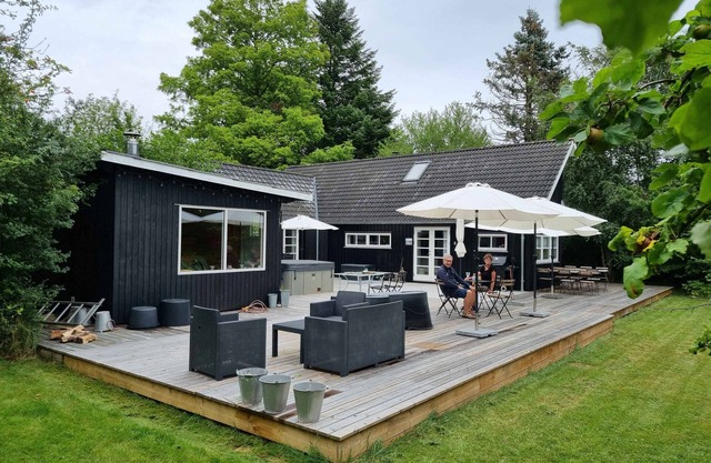 Modern house with outdoor spa and sauna