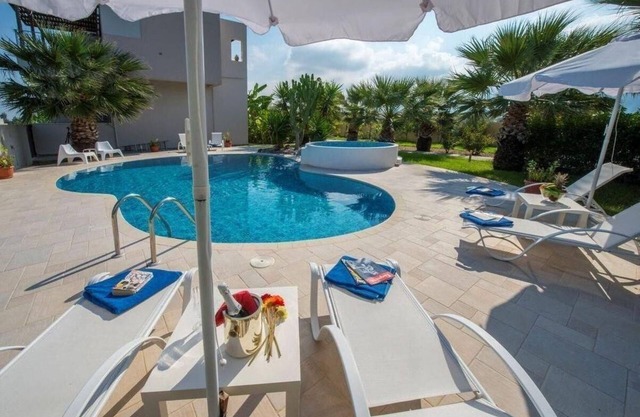 Modern luxury villa with private pool and a big garden, sea view and near the sea